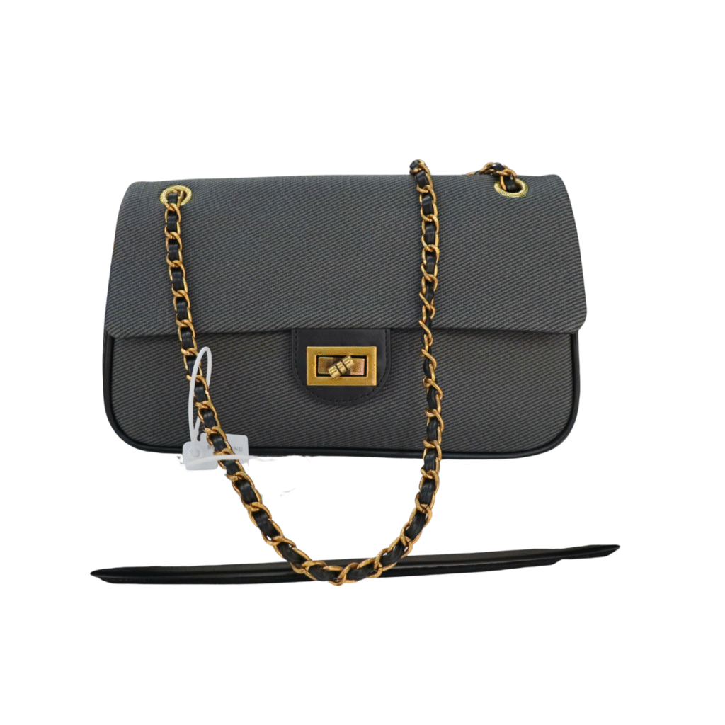 Black chain flap shoulder bag with gold hardware and turn-lock